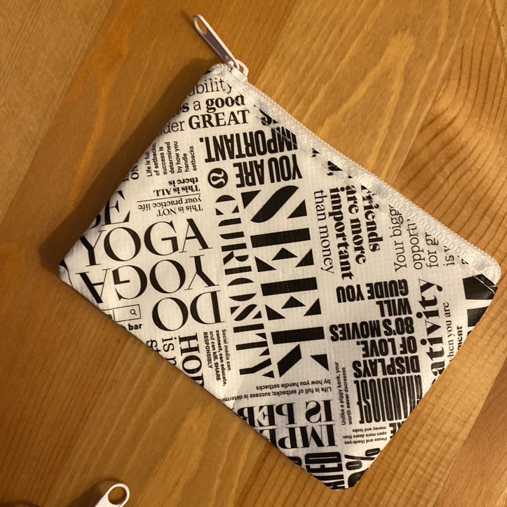 Lululemon zip coin pouch / wallets in white